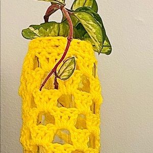 About 4in long with handmade crochet